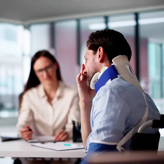 a man with a neck brace and a woman with a neck brace