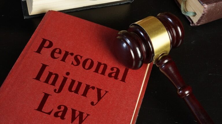 Personal Injury Law book and judge's gavel