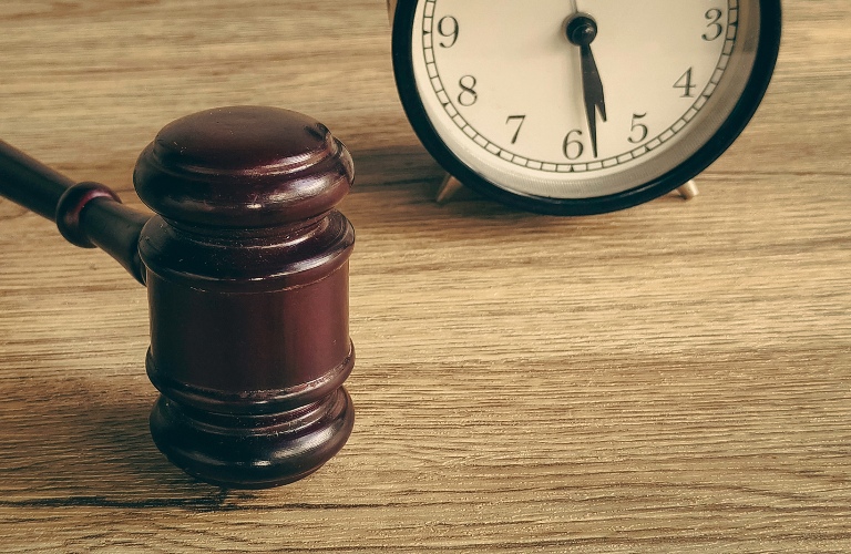 Judge's gavel and clock